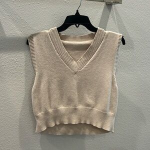 tan sweater vest